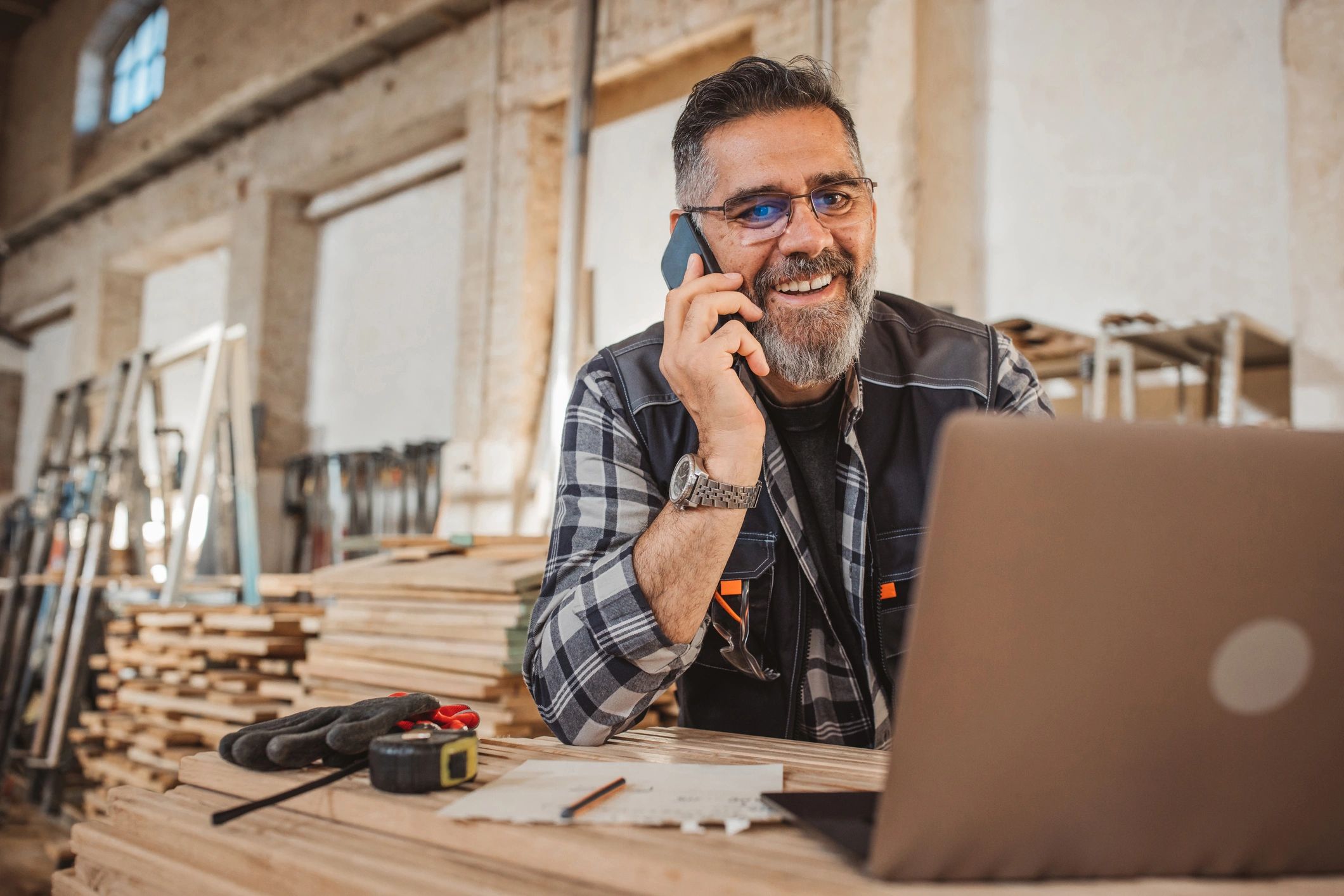 Modern workspace with technology and woodworking elements